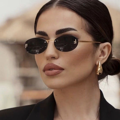 نظارة شمسية بيضاوية بدون إطار بحرف F مرصع